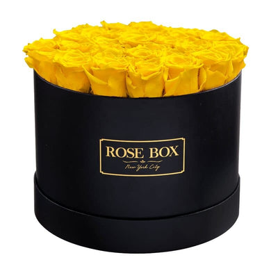 Large Round Black Box with Bright Yellow Roses