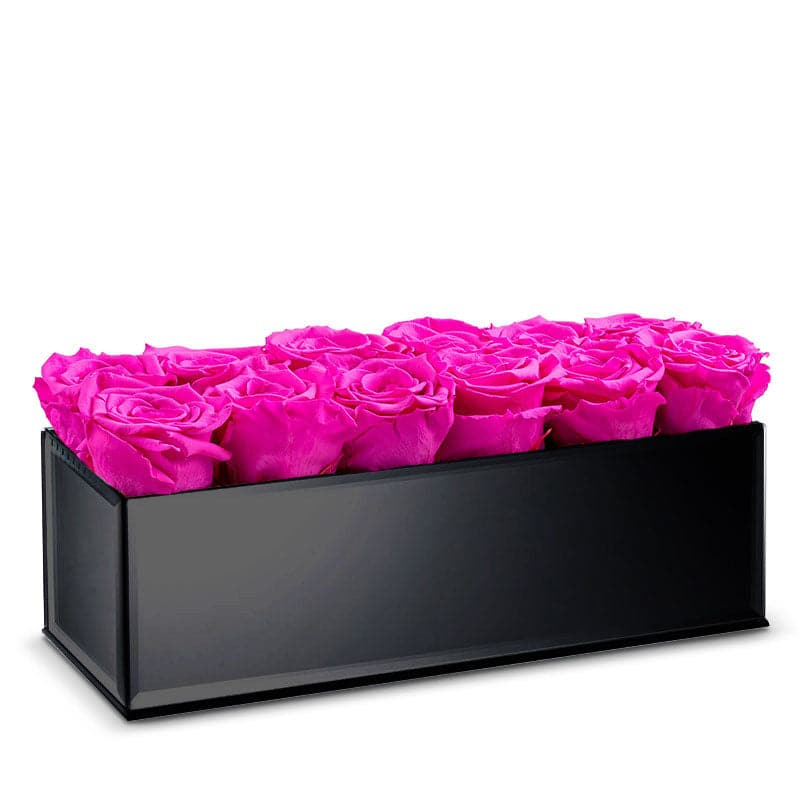 Black Table Centerpiece with Neon Pink Roses