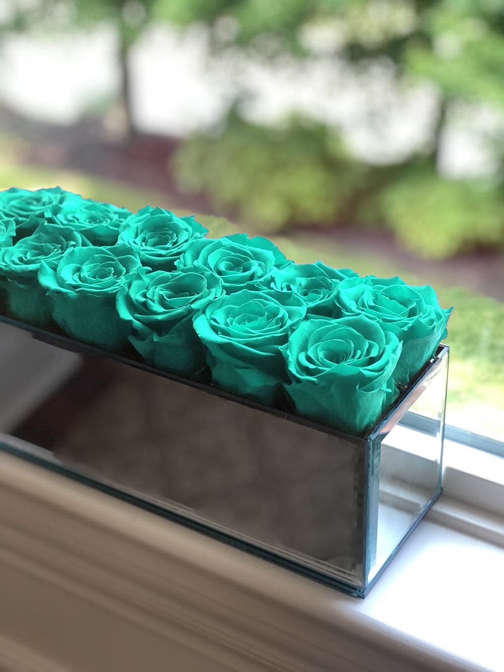 Silver Mirrored Table Centerpiece with Turquoise Roses